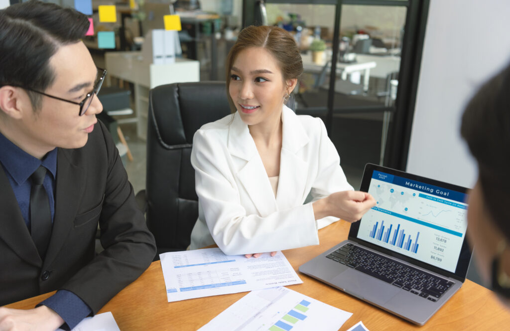 business people meeting about business plan present explain stock financial chart