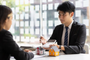 businessman real estate agent presenting a price 2023 11 27 05 21 55 utc