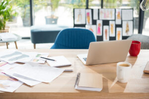 fashion designer workplace with laptop and sketche 2023 11 27 05 02 26 utc