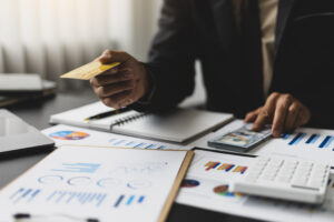 businessman holding credit card and checking credi 2023 11 27 05 24 42 utc