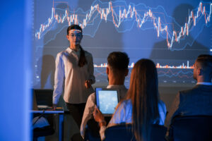 showing the plan on the projector female leader t 2023 11 27 05 09 18 utc